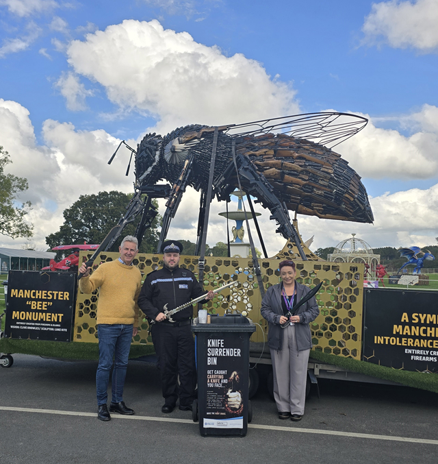 (left to right) Clive Knowles, chairman of the British Ironwork Centre, Inspector Jack Zielinski, of Warwickshire Police, and Claire Baldwin, Rugby Borough Council's community safety team leader, with some of the blades handed in during the Knife Free Rugby campaign launch amnesty.